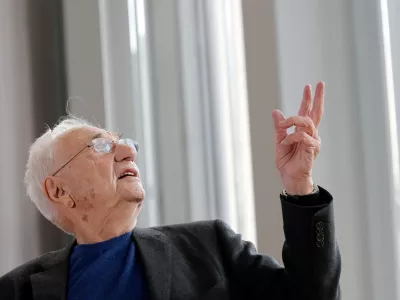 FILE - American architect Frank Gehry speaks to journalists during the press day of his latest creation, the Louis Vuitton Foundation art museum and cultural center, in Paris, Oct. 17, 2014. (AP Photo/Christophe Ena, File)