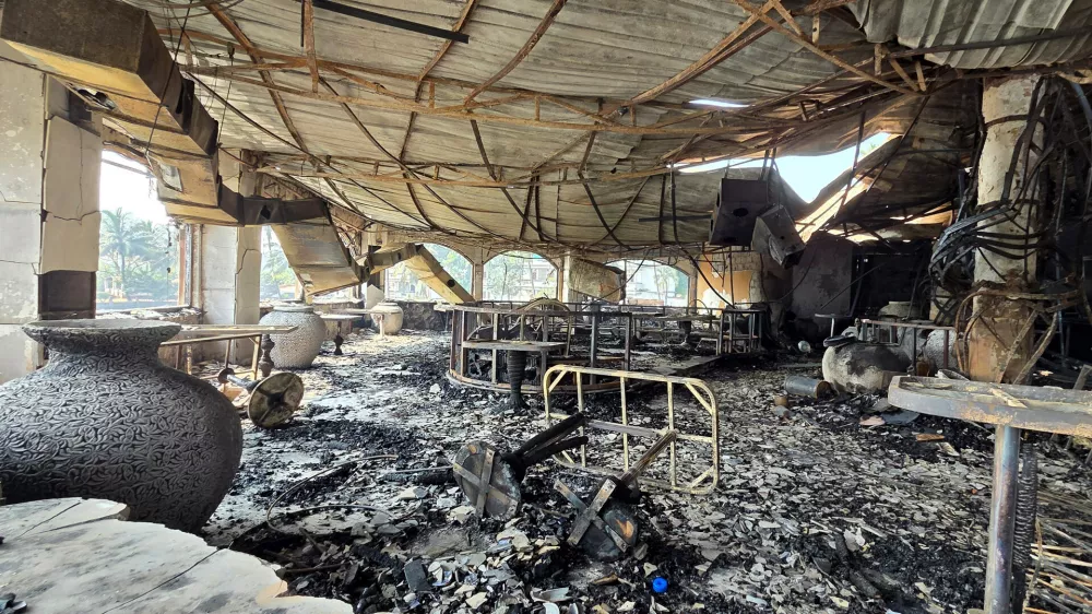 The charred interiors of a nightclub, which caught fire early Sunday, are seen in Arpora, Goa, India, Sunday, Dec. 7, 2025. (AP Photo)