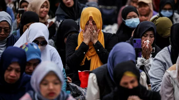 Mourners attend a Muslim prayer gathering, organized by the Indonesian community, for victims of the deadly fire that occurred on Wednesday at the Wang Fuk Court housing complex in Tai Po, in Hong Kong, China, November 30, 2025. REUTERS/Amr Alfiky   TPX IMAGES OF THE DAY        SEARCH "HONG KONG LOSS" FOR THIS STORY. SEARCH "WIDER IMAGE" FOR ALL STORIES.