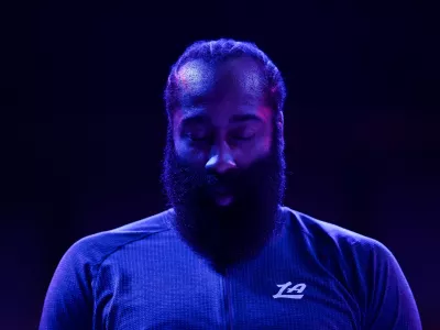 Los Angeles Clippers guard James Harden (1) stands during the national anthem before an NBA basketball game against the Minnesota Timberwolves Saturday, Dec. 6, 2025, in Minneapolis. (AP Photo/Matt Krohn)