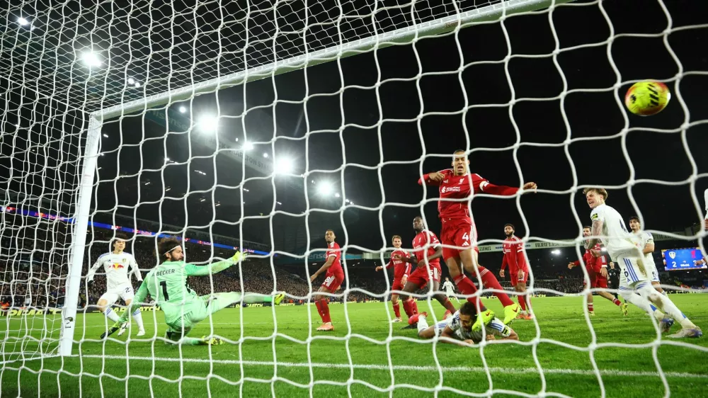 Soccer Football - Premier League - Leeds United v Liverpool - Elland Road, Leeds, Britain - December 6, 2025 Leeds United's Ao Tanaka scores their third goal Action Images via Reuters/Andrew Boyers EDITORIAL USE ONLY. NO USE WITH UNAUTHORIZED AUDIO, VIDEO, DATA, FIXTURE LISTS, CLUB/LEAGUE LOGOS OR 'LIVE' SERVICES. ONLINE IN-MATCH USE LIMITED TO 120 IMAGES, NO VIDEO EMULATION. NO USE IN BETTING, GAMES OR SINGLE CLUB/LEAGUE/PLAYER PUBLICATIONS. PLEASE CONTACT YOUR ACCOUNT REPRESENTATIVE FOR FURTHER DETAILS..