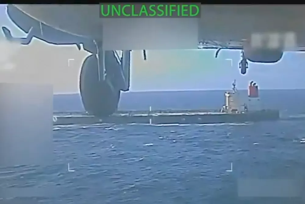 This image from video posted on Attorney General Pam Bondi's X account, and partially redacted by the source, shows an oil tanker being seized by U.S. forces off the coast of Venezuela, Wednesday, Dec. 10, 2025. (U.S. Attorney General's Office/X via AP)