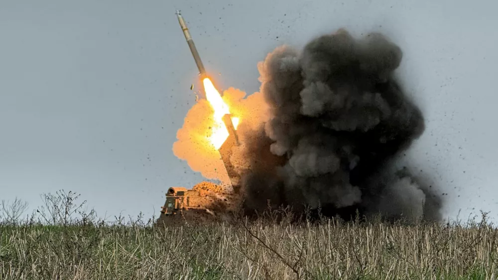 Ukrainian servicemen fire a Multiple Launch Rocket System (MLRS) towards Russian troops, amid Russia's attack on Ukraine, near the frontline town of Pokrovsk in Donetsk region, Ukraine December 9, 2025. REUTERS/Stringer