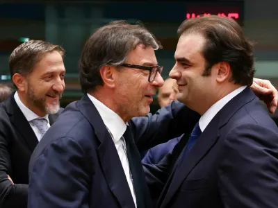 Greek Finance Minister Kyriakos Pierrakakis, Slovenia's Minister for Finance Klemen Bostjancic and Italian Economy and Finance Minister Giancarlo Giorgetti attend a Eurogroup Finance Ministers meeting in Brussels, Belgium December 11, 2025. REUTERS/Yves Herman