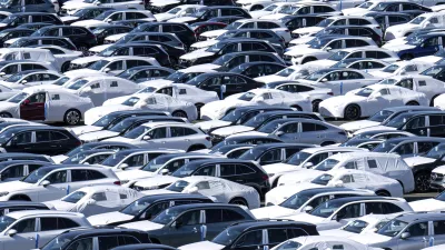 Cars are lined up before being loaded onto ships in the port at BLG Autoterminal Bremerhaven, Germany, Tuesday, April 1, 2025. (Sina Schuldt/dpa via AP)