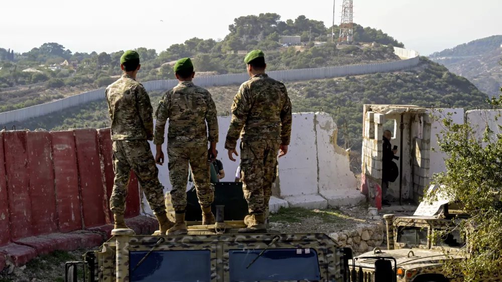 November 28, 2025, Wadi Zibqin, Wadi Zibqin, Lebanon: Lebanese soldiers look at an Israeli post opposite to their position the southern Lebanese border village in Alma al-Shaab during a media tour by the armed forces to review the operations in the southern Litani sector. The visit aimed to show the restoration of state control and disarming non-state actors in the region. This was described as a first-time event in the context of recent post-ceasefire operations. (Credit Image: &copy; Marwan Naamani/ZUMA Press Wire)