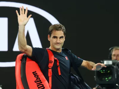 ﻿FILE PHOTO: Tennis - Australian Open - Semi Final - Melbourne Park, Melbourne, Australia - January 30, 2020. Switzerland's Roger Federer looks dejected after his match against Serbia's Novak Djokovic. REUTERS/Kai Pfaffenbach/File Photo