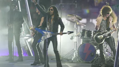 Lenny Kravitz performs before the Champions League final soccer match between Borussia Dortmund and Real Madrid at Wembley stadium in London, Saturday, June 1, 2024. (AP Photo/Dave Shopland)