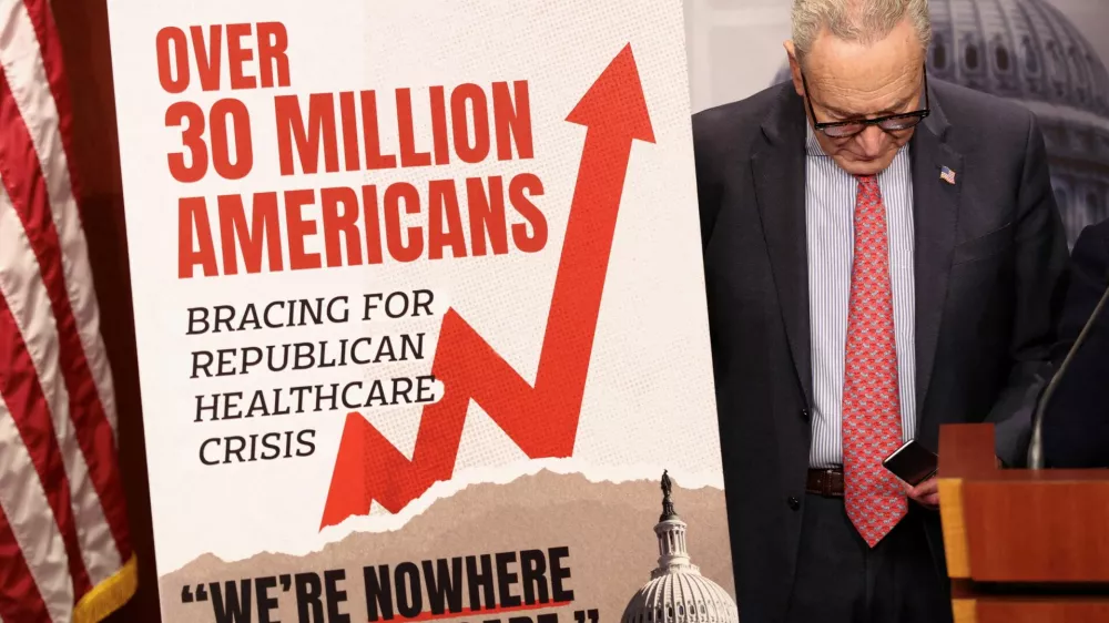 U.S. Senate Democratic Leader Chuck Schumer looks down during a news conference following Senate votes on competing healthcare plans, at the U.S. Capitol in Washington, D.C., U.S., December 11, 2025. REUTERS/Kevin Lamarque