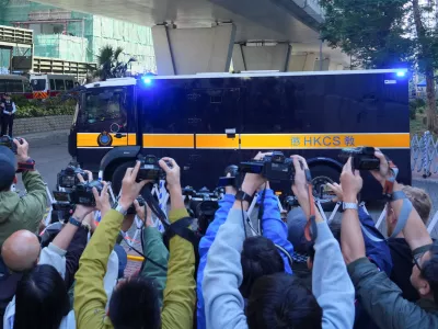 A prison van believed to be carrying Jimmy Lai, leaves the West Kowloon Magistrates' Courts building after the verdict in the national security collusion trial of Jimmy Lai, founder of the now-defunct pro-democracy newspaper Apple Daily, in Hong Kong, China, December 15, 2025. REUTERS/Lam Yik