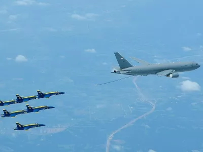 A KC-46 Pegasus assigned to the 931st Air Refueling Wing, McConnell Air Force Base, Kan., lines up to refuel an U.S. Navy Blue Angels F/A-18 Hornet, July 1, 2020 over South Dakota. This marks the first time the 931st ARW refueled the Blue Angels using a KC-46. The KC-46 represents the beginning of a new era in air-to-air refueling capability to support the U.S. Air Force, Navy and Marine Corps. The modernized fly-by-wire boom provides a larger air-refueling envelope than the KC-46's predecessor, the KC-135 Stratotanker. In addition to the boom, the aircraft is capable of refueling through drogue and wing aerial fueling pods, or WARPs, to provide simultaneous multi-point air refueling. (U.S. Air Force photo by Maj. Andrea Morris)