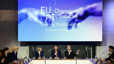 France's President Emmanuel Macron addresses investors next to German chancellor Friedrich Merz and Managing director and Head of Europe at General Catalyst Jeannette zu Fürstenberg at the EU AI Champions Initiative at a summit on Europe's technological sovereignty, in the EUREF Campus in Berlin, Germany, November 18, 2025. JOHN MACDOUGALL/Pool via REUTERS