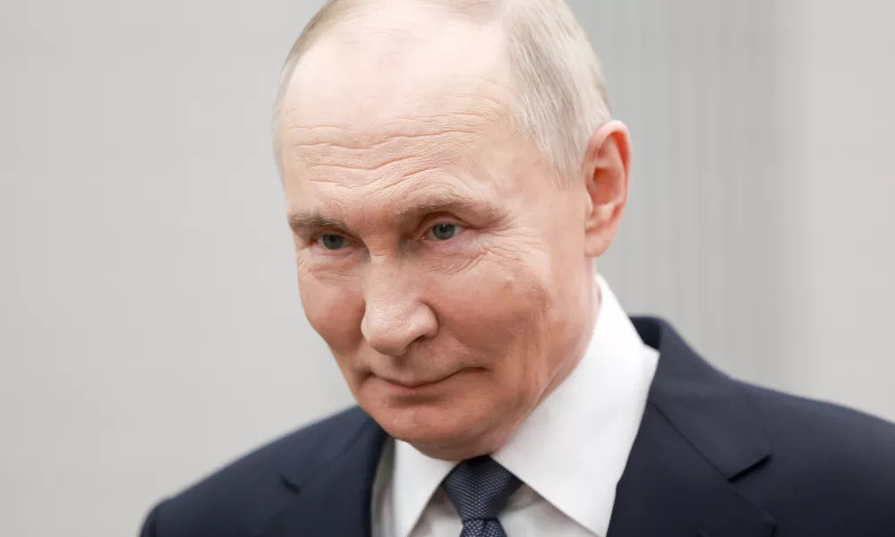 Russian President Vladimir Putin attends an international forum of civil participation "We Are Together" in Moscow, Russia, Wednesday, Dec. 3, 2025. (Alexander Shcherbak, Sputnik, Kremlin Pool Photo via AP)