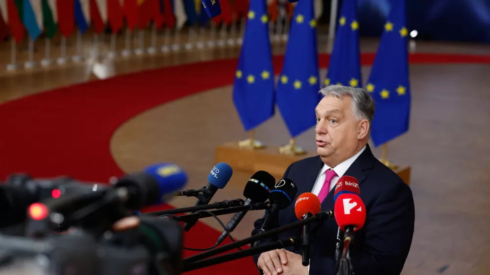 Hungary's Prime Minister Viktor Orban speaks with the media as he arrives for the EU Summit in Brussels, Thursday, Dec. 18, 2025. (AP Photo/Geert Vanden Wijngaert)
