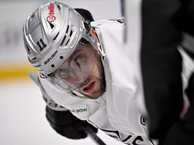 Dec 15, 2025; Dallas, Texas, USA; Los Angeles Kings center Anze Kopitar (11) waits for the face-off against the Dallas Stars during the third period at the American Airlines Center. Mandatory Credit: Jerome Miron-Imagn Images