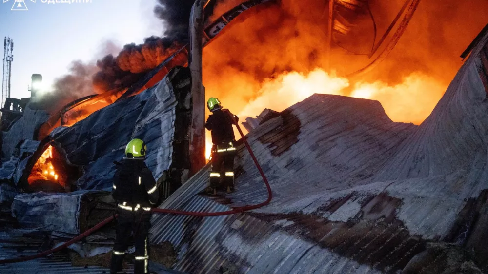 Firefighters work at the site of a warehouse of home appliances which was hit during an overnight Russian drone strike, amid Russia's attack on Ukraine, in Odesa, Ukraine December 16, 2025. Press service of the State Emergency Service of Ukraine in Odesa region/Handout via REUTERS ATTENTION EDITORS - THIS IMAGE HAS BEEN SUPPLIED BY A THIRD PARTY. DO NOT OBSCURE LOGO.