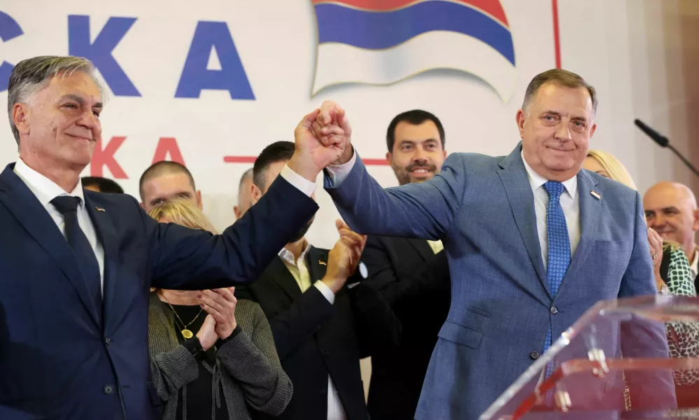 Milorad Dodik, former President of the Bosnian Serb Republic, and Sinisa Karan attend a press conference after preliminary results indicated Karan won a snap presidential election in Banja Luka, Bosnia and Herzegovina, November 23, 2025. REUTERS/Amel Emric