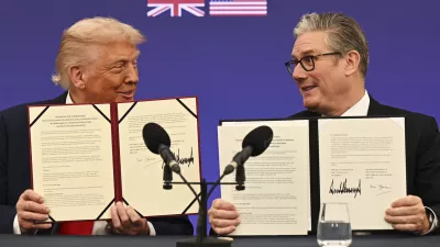 President Donald Trump and Britain's Prime Minister Keir Starmer announce an agreement between the two countries during a joint press conference at Chequers near Aylesbury, England, Thursday, Sept. 18, 2025. (Leon Neal/Pool Photo via AP)