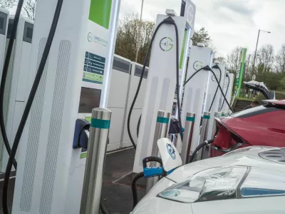 2XBHF6A Electric Vehicles charging at Annandale motorway service station on the A74 (M) near Lockerbie Scotland