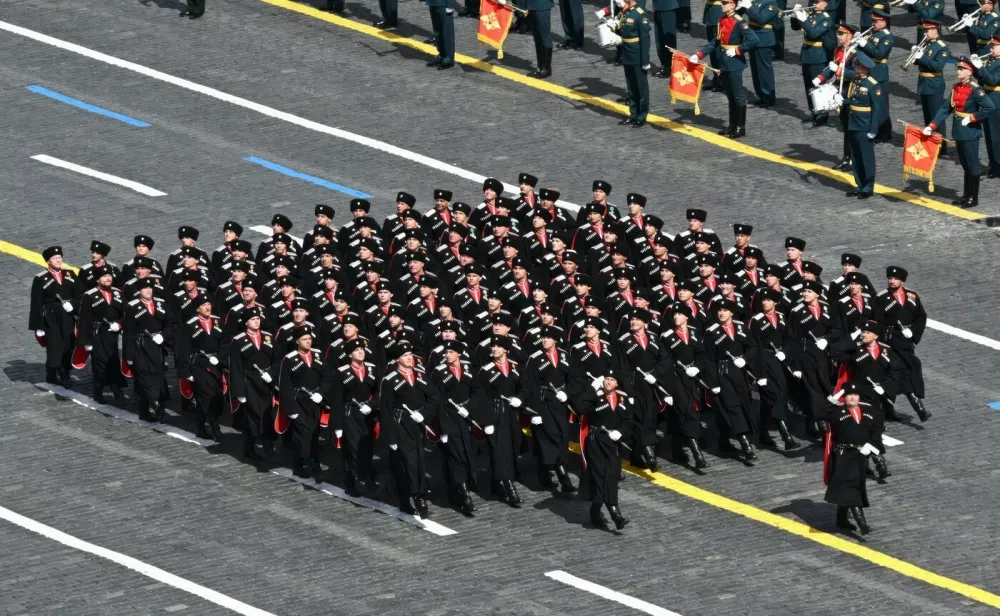 Russian Cossack soldiers march past the review stand during the annual Victory Day military parade through Red Square, May 9, 2025, in Moscow, Russia.Russia Celebrates 80th Anniversary Of Victory Over Nazi Germany In World War II, Moscow, Moscow Oblast - 09 May 2025,Image: 998679546, License: Rights-managed, Restrictions: ***HANDOUT image or SOCIAL MEDIA IMAGE or FILMSTILL for EDITORIAL USE ONLY! * Please note: Fees charged by Profimedia are for the Profimedia's services only, and do not, nor are they intended to, convey to the user any ownership of Copyright or License in the material. Profimedia does not claim any ownership including but not limited to Copyright or License in the attached material. By publishing this material you (the user) expressly agree to indemnify and to hold Profimedia and its directors, shareholders and employees harmless from any loss, claims, damages, demands, expenses (including legal fees), or any causes of action or allegation against Profimedia arising out of or connected in any way with publication of the material. Profimedia does not claim any copyright or license in the attached materials. Any downloading fees charged by Profimedia are for Profimedia's services only. * Handling Fee Only ***, Model Release: no