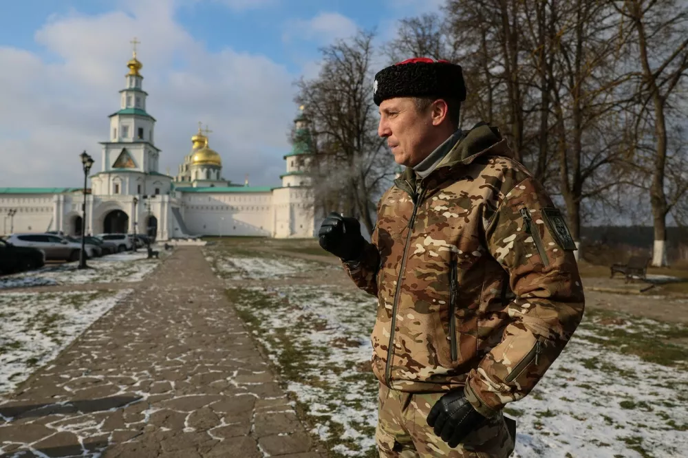 Yury, the 39-year-old school employee who participated in Russia's military action in Ukraine as a radio operator in a Cossack artillery brigade of a private paramilitary company under call sign "Lokomotiv" (Locomotive) - a reference to his favourite Moscow football club, attends an AFP interview in the town of Istra in the Moscow region on February 7, 2025.,Image: 968238620, License: Rights-managed, Restrictions:, Model Release: no