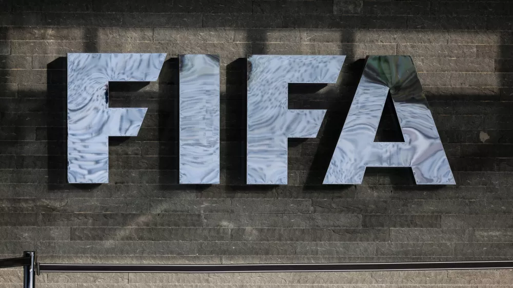 FILED - 13 December 2024, Switzerland, Zurich: The FIFA logo is seen on the facade of FIFA headquarters before the draw ceremony for the 2026 FIFA World Cup qualifiers. Photo: Christian Charisius/dpa