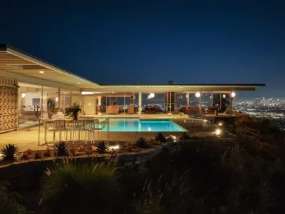 Story from Jam Press (Famous Hollywood House)Pictured: LA's Iconic Stahl House, also known as Case Study House #22.Famous Hollywood Stahl house hits market for the first time in 65 YEARSA luxurious house in Hollywood belonging to the famous Stahl family has hit the market for the first time in 65 years.And it comes with an impressive history.The home dates back to 1958, when it was commissioned by the Arts and Architecture magazine.It was part of a series of Case Study properties that were built as an experimental solution to the post-war housing boom.And not long after, it was snapped by the C.H. "Buck" Stahl, who was a painter, graphic designer and professional football player, reports&nbsp;Luxury Property News.It was made famous by photographer Julius Shulman, who pictured two women lounging in the home, as well as featuring in television shows and films such as Galaxy Quest, Columbo and Nurse Betty.The Stahl House &ndash;&nbsp;or Case Study House #22 &ndash;&nbsp;is located in the heart of Hollywood Hills; just a mile away from Sunset Strip.It boasts 270-degree views of Los Angeles and sprawls across 2,200 sq ft.Inside, the design is modern and simple.Dark brown tones contrast against beige walls, ceilings and flooring &ndash;oozing a sense of luxury.In the kitchen, a plaque is proudly positioned to mark its title in history, crowning it a historic-cultural monument.Glass walls adorn the place from top-to-bottom, allowing natural sunlight to flow through and further expand the open-plan living space.A central fireplace in the living room is great for entertaining guests on a cold evening.And access to outside via sliding doors brings focus onto the expansive swimming pool.Then, the money shot, the view of the city's twinkling lights.Pierre Koenig, who crafted the home, made sure it was one-of-a-kind; including frames of the Hollywood Sign from the bathroom.Accessed via a gated drive, privacy and security is at the forefront of its design.And with neighbours including Leonardo DiCaprio, Kenau Reeves, Halle Berry and Taylor Swift, it's a certain showstopper.The current owners have offered public tours since 2007 &ndash;&nbsp;but now, for the first time in 65 years, it's on the market for a cool 5m (USD) (Ł18.6m).The listing, which features on&nbsp;Top 10 Real Estates, is held by William Baker of the Agency Beverly Hills.ENDSEDITOR'S NOTE: All press must include mention of Top 10 Real Estate Deals as per condition of use. Digital press must hyperlink where possible:&nbsp;https://toptenrealestatedeals.com/weekly-ten-best-home-deals/home/las-iconic-stahl-house-most-famous-us-modern-home-since-fallingwater-lists-for-25-million,Image: 1059667994, License: Rights-managed, Restrictions: EDITOR'S NOTE: All press must include mention of Top 10 Real Estate Deals as per condition of use. Digital press must hyperlink where possible:&nbsp;https://toptenrealestatedeals.com/weekly-ten-best-home-deals/home/las-iconic-stahl-house-most-famous-us-modern-h, Model Release: no