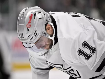 Dec 15, 2025; Dallas, Texas, USA; Los Angeles Kings center Anze Kopitar (11) looks down during the third period against the Dallas Stars at the American Airlines Center. Mandatory Credit: Jerome Miron-Imagn Images