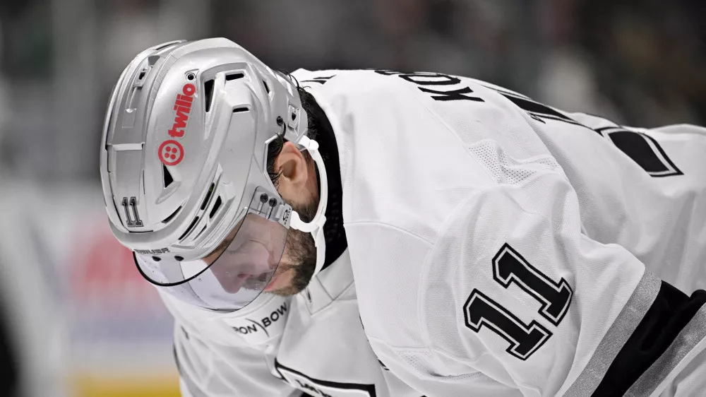 Dec 15, 2025; Dallas, Texas, USA; Los Angeles Kings center Anze Kopitar (11) looks down during the third period against the Dallas Stars at the American Airlines Center. Mandatory Credit: Jerome Miron-Imagn Images
