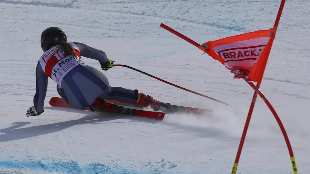 Italy's Sofia Goggia speeds down the course during an alpine ski, women's World Cup super G in St. Moritz, Switzerland, Saturday, Dec. 14, 2019. (AP Photo/Alessandro Trovati)