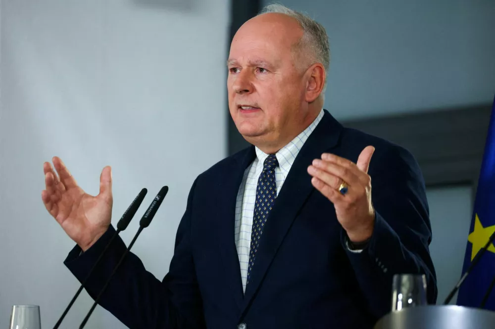 FILE PHOTO: Secretary of State at the Polish Ministry of Defence Pawel Zalewski speaks during a press conference after a European Group of Five (E5) defence ministers meeting, which includes Britain, France, Germany, Italy, and Poland, together with European Union High Representative for Foreign Affairs and Security Policy and European Commission Vice-President Kaja Kallas, to discuss additional aid for Ukraine, in Berlin, Germany, November 14, 2025. REUTERS/Christian Mang/File Photo