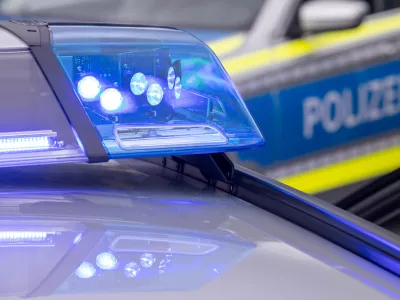 FILED - 04 August 2021, Bavaria, N&uuml;rnberg: A blue light on the roof of a police vehicle. Human body parts have been found on a motorway in western Germany, police said on Monday. Photo: Daniel Karmann/dpa