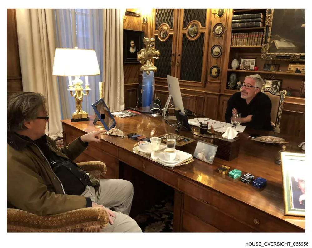 Late financier and convicted sex offender Jeffrey Epstein and Steve Bannon are seen in this handout image from the Epstein estate released by House Oversight Committee Democrats in Washington, D.C., U.S., on December 18, 2025. House Oversight Committee Democrats/Handout via REUTERS THIS IMAGE HAS BEEN MODIFIED AND SUPPLIED BY A THIRD PARTY. REDACTED AREA FROM SOURCE.  /Handout via REUTERS  THIS IMAGE HAS BEEN SUPPLIED BY A THIRD PARTY