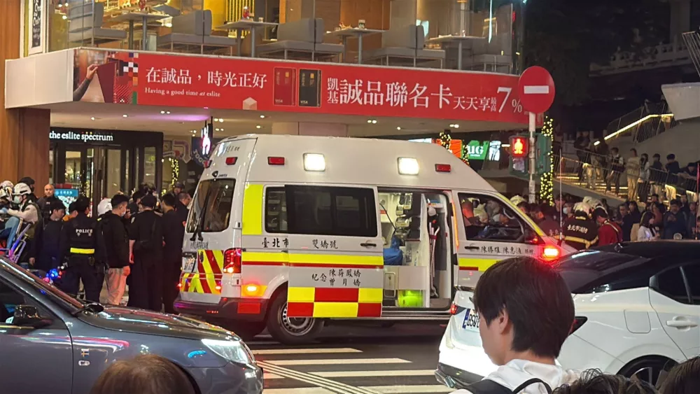 An ambulance stands outside Eslite Spectrum Nanxi store near Zhongshan station, following an incident in which several were injured after a person released smoke bombs and attacked bystanders, according to the government and local media, in Taipei, Taiwan, December 19, 2025. REUTERS/Ann Wang
