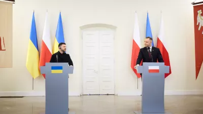 HANDOUT - 19 December 2025, Poland, Warsaw: Ukrainian President Volodymyr Zelensky and Polish President Karol Nawrocki (R) hold a joint press conference at the Presidential Palace in Warsaw. Photo: -/Ukrainian Presidency/dpa - ATTENTION: editorial use only and only if the credit mentioned above is referenced in full