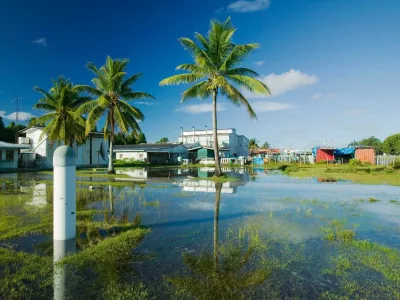 This image was taken in 2007, showing a town submerged in water on the Funafuti Atoll. Its population of more than 6,000 people has been battling with the direct consequences of rising sea levels. Residents of the capital Tuvalu have seen very frequent flooding in populated areas due to the fact that it is at most 4.57 meters (15 feet) above sea level. Dubbed one of "the most vulnerable Pacific Ocean islands," its residents have to make the ultimate choice: leave the islands or deal with the consequences.