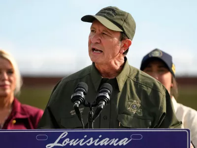 FILE - Louisiana Gov. Jeff Landry speaks to reporters at the Louisiana State Penitentiary in Angola, La., Sept. 3, 2025. (AP Photo/Gerald Herbert, File)