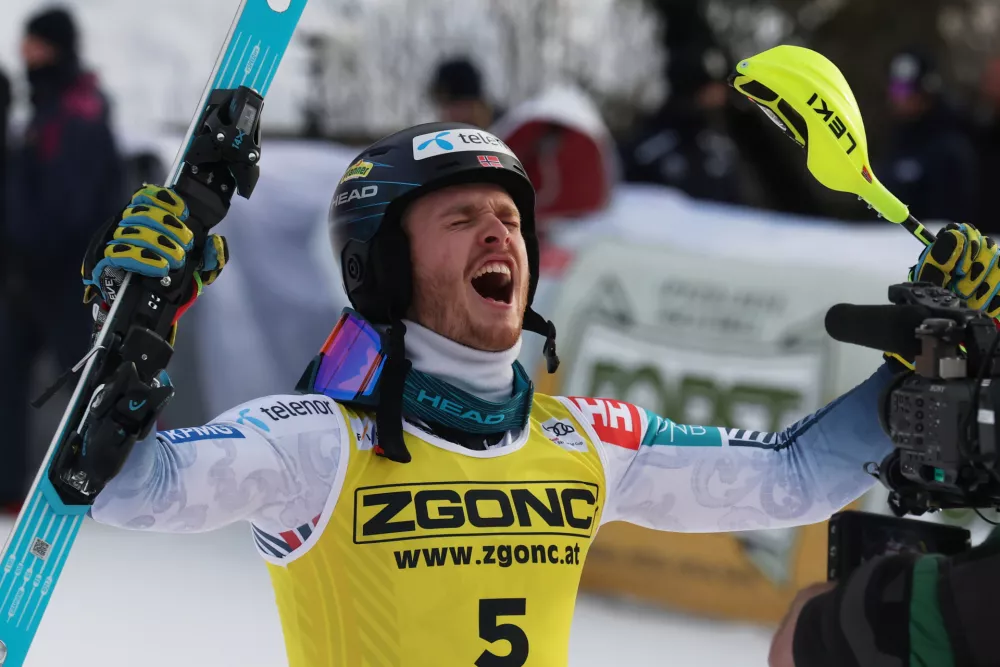 Norway's Atle Lie McGrath celebrates at the finish area of an alpine ski, men's World Cup slalom, in Alta Badia, Italy, Monday, Dec. 22, 2025. (AP Photo/Alessandro Trovati)