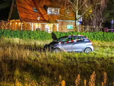 22 December 2025, Netherlands, Nunspeet: A car stands in the grass after a serious accident on the Elburgerweg. A car has driven into a crowd of people in the Netherlands. Photo: -/ANP/dpa
