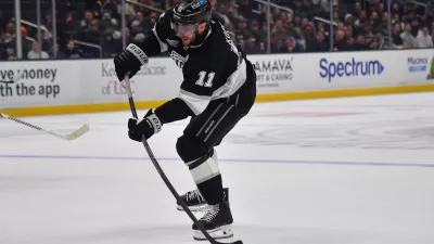 Dec 22, 2025; Los Angeles, California, USA; Los Angeles Kings center Anze Kopitar (11) shoots on goal against the Columbus Blue Jackets during the second period at Crypto.com Arena. Mandatory Credit: Gary A. Vasquez-Imagn Images