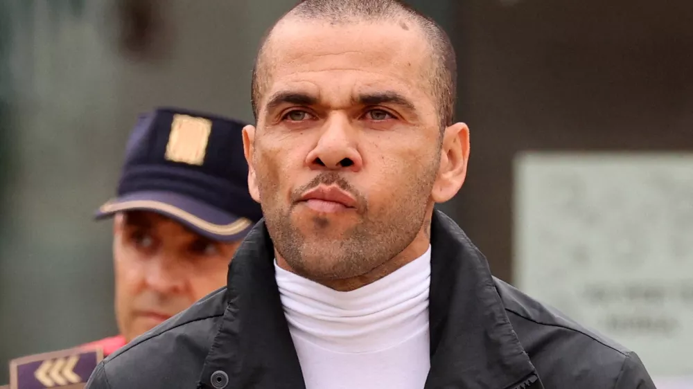FILE PHOTO: Soccer Football - Dani Alves Release From Prison - Brians 2 Prison, Barcelona, Spain - March 25, 2024 Brazilian soccer player Dani Alves leaves the Brians 2 prison on bail while he appeals his rape conviction REUTERS/Nacho Doce/File Photo