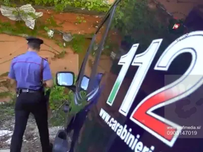 Story from Jam Press (Mafia Village Seized) Pictured: A video grab of the police seizing a mini 'mafia holiday village' that was built illegally, 40 years ago. VIDEO: Cops seize mini 'mafia holiday village' with 43 homes illegally built 40 years agoPolice have seized a mini "mafia holiday village" consisting of 43 homes &ndash; four decades after it sprung up in a prime real estate spot by the sea.Brothers Salvatore, Domenico and Pasquale Belforte from the Belforte Clan began building the holiday village in the 1980s.Pasquale is a construction entrepreneur.The homes started out as small containers in a popular area of dunes and pine forests.Seven of the villas were occupied by close relatives of Salvatore and Domenico, who have been in prison for years.The two brothers were bosses and founders of the clan from Marcisiane in northern Italy.Their holiday village is located in Bagnara di Castel Volturno in the north-west of Naples.It was erected in plain sight, but no one ever reported it.Prosecutors ordered the seizure of the properties, which were illegally constructed on public land, on Wednesday 28 August, according to local media.Every summer, the same families gathered at the site, even after the two bosses were arrested.Pasquale, their sister, Rosa, and about 18 other close relatives were holidaying in the village at the time of the seizure.They were among 65 people identified and evicted by the police and the coastguard.The Belforte Clan is among the oldest and most powerful clans of the notorious Camorra criminal organisation.The clan operates in about 15 towns around and in Marcisiane, as reported by NeedToKnow.Its alleged activities include drug trafficking, extortion, loan sharking and construction.The Camorra from Campania is among Italy's "big three" mafias, along with the 'Ndrangheta from Calabria and Cosa Nostra from Sicily.ENDSEDITOR'S NOTE: Quotations have been translated to English.Video Usa,Fotografija:903147019, Licenca:Rights-managed, Omejitve:, Model izdaje:no