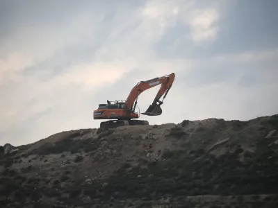 23 December 2025, Palestinian Territories, Jenin: Israeli bulldozers are seen working in the abandoned Jewish settlement of Sa'anur, south of Jenin in the West Bank, in preparation for the return of Jewish settlers, following the Israeli government's approval of their return. Photo: Nasser Ishtayeh/SOPA Images via ZUMA Press Wire/dpa