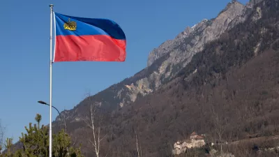 A flag of Liechtenstein flutters in front of the Vaduz Castle near Vaduz, Liechtenstein, March 3, 2025. REUTERS/Denis Balibouse