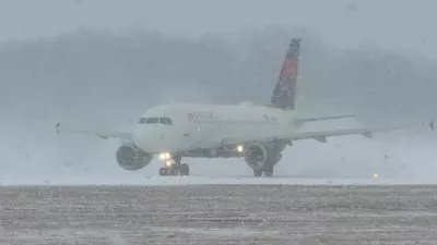 A Delta Air Lines plane prepares to take off during a winter storm at Greater Rochester International Airport in Rochester, New York, U.S., December 26, 2025, in this screengrab obtained from a social media video. Joseph Frascati/via REUTERS THIS IMAGE HAS BEEN SUPPLIED BY A THIRD PARTY. MANDATORY CREDIT. NO RESALES. NO ARCHIVES. VERIFICATION: Reuters was able to verify the location from runway, buildings, and utility tower which matched file and satellite images. Reuters was able to verify the date of the footage from original file metadata.
