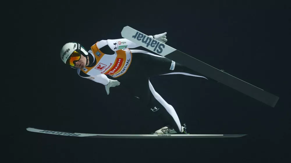 Ski Jumping - FIS Ski Jumping World Cup - Klingenthal, Germany - December 12, 2025 Slovenia's Domen Prevc in action during the Men's Individual Large Hill qualification REUTERS/Lisi Niesner