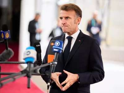 French President Emmanuel Macron arrives at an informal summit in the Danish parliament at Christiansborg Castle in Copenhagen, Wednesday, Oct. 1, 2025. (Thomas Traasdahl/Ritzau Scanpix via AP)