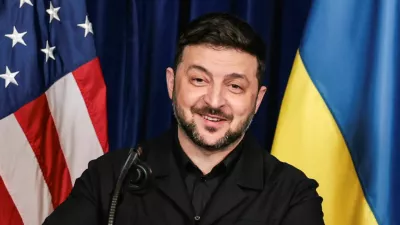 Ukrainian President Volodymyr Zelenskiy smiles after U.S. President Donald Trump said that Russian President Vladimir Putin expressed willingness to help Ukraine "succeed", during a press conference at Trump's Mar-a-Lago club, in Palm Beach, Florida, U.S., December 28, 2025. REUTERS/Jonathan Ernst   TPX IMAGES OF THE DAY