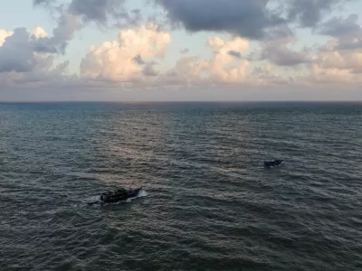 A boat that migrants say carries Venezuelan migrants sails offshore, a day after another boat carrying mostly Venezuelan migrants, some of whom said they were returning to Venezuela after being deported or failing to cross into the United States, sank near the coast of Colon, resulting in multiple casualties, in Miramar, Panama, December 28, 2025. REUTERS/Enea Lebrun