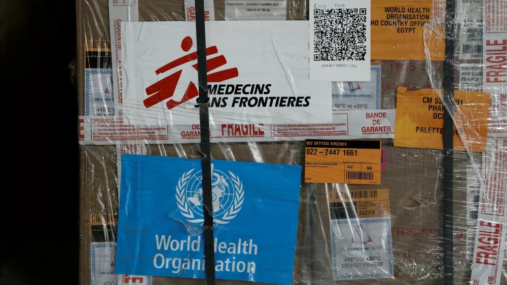 FILE PHOTO: View of humanitarian supplies for Gaza, with the logos of Medecins Sans Frontieres (Doctors Without Borders) and World Health Organization, stored at the Egyptian Red Crescent warehouses storing aid, in the Egyptian border town of El-Arish, Egypt, April 8, 2025. REUTERS/Benoit Tessier/Pool/File Photo